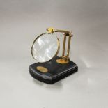 A useful desk magnifying glass, base size 13 x 17cm.