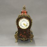 A 19thC French Boulle mantle clock, H. 31cm.