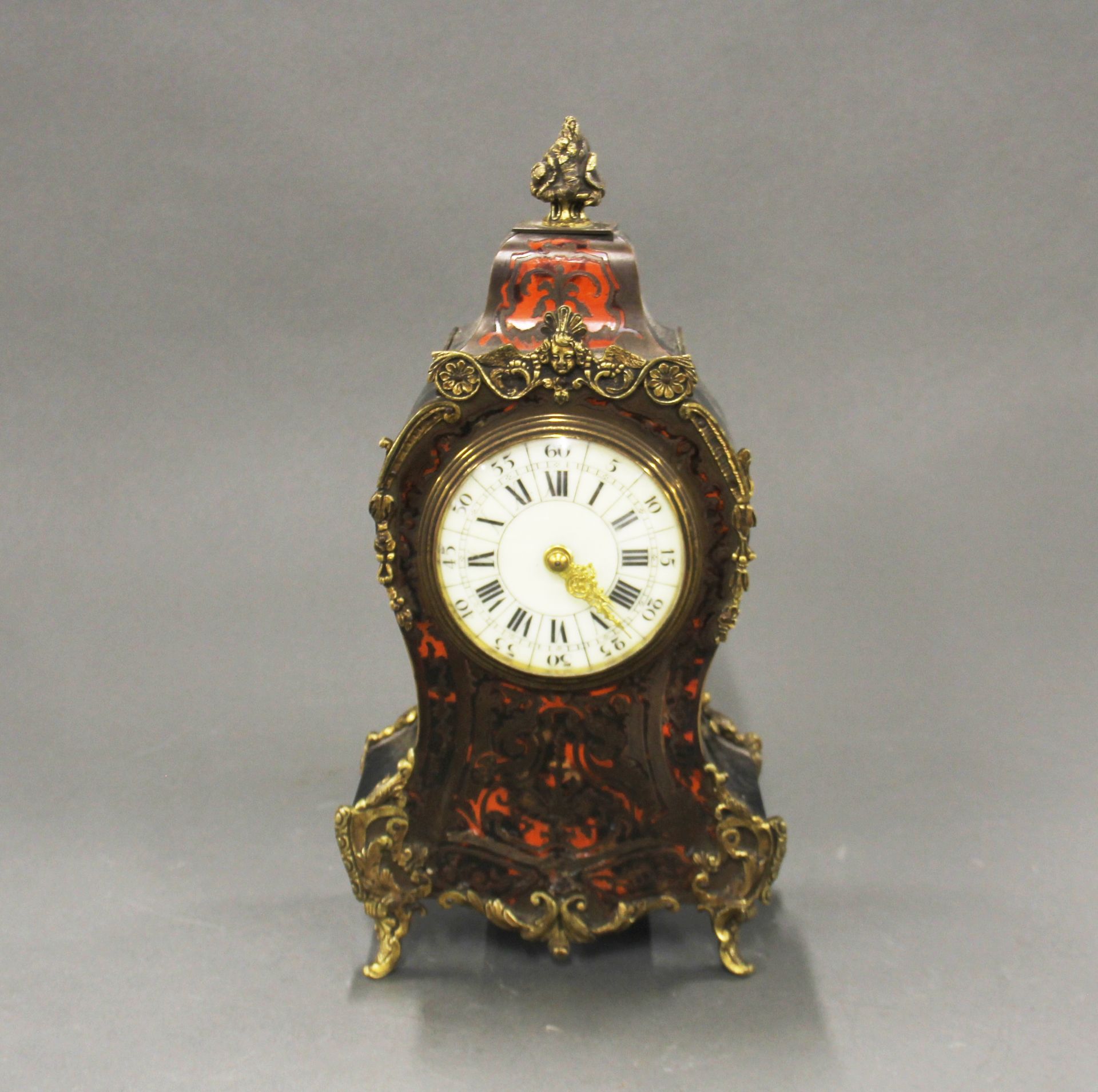 A 19thC French Boulle mantle clock, H. 31cm.