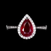 A 925 silver ring set with a pear cut ruby and white stones, (M.5).