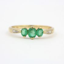 A 9ct yellow gold emerald and diamond set ring, (S).