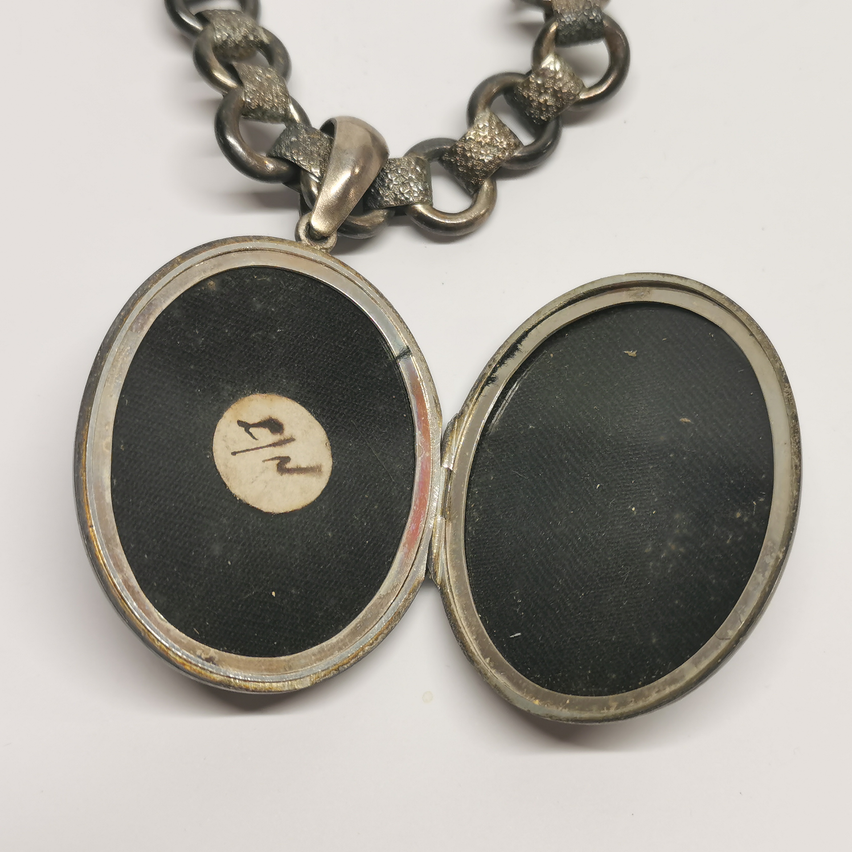 A Victorian white metal locket and chain, L. 48cm. - Image 4 of 4