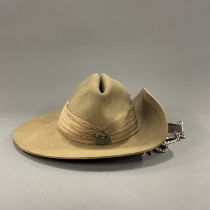 An Australian military bush hat with a watch chain.