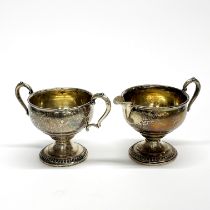 A sterling silver sugar bowl and milk jug, H. 8.5cm.