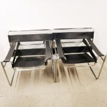 A pair of stainless steel and leather Wassily lounge chairs, W. 77cm, D. 67cm.