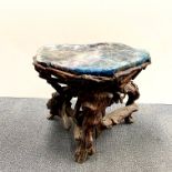 A superb Chinese carved fluorite ink grinding stone with draining holes in naturalistic form