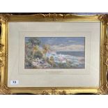 A gilt framed watercolour behind glass depicting the old town of Bordighera, signed Chas