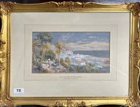 A gilt framed watercolour behind glass depicting the old town of Bordighera, signed Chas