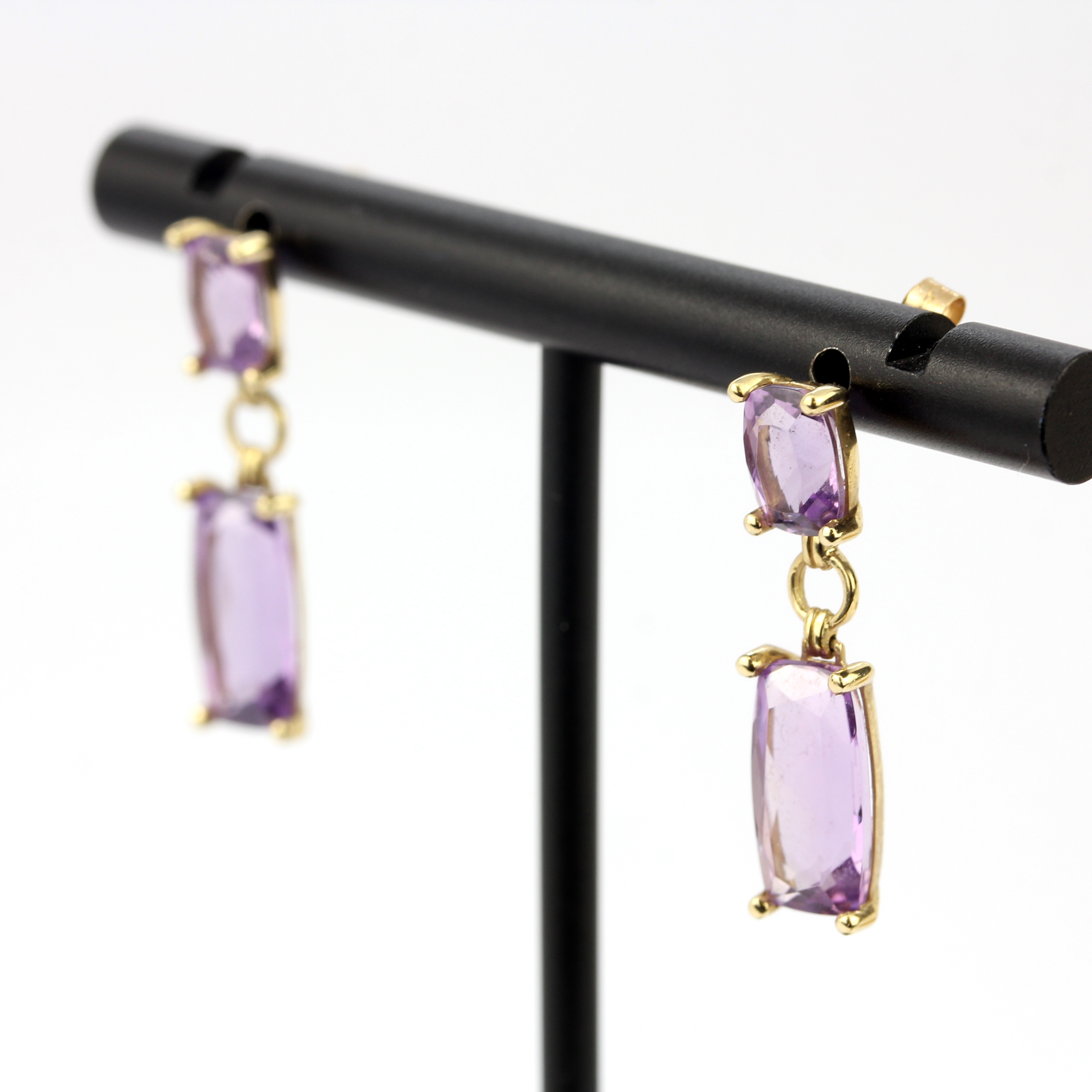 A pair of 9ct yellow gold droop earrings set with fancy cut amethysts, L. 2.5cm. - Image 2 of 3