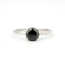 A 925 silver solitaire ring set with a brilliant cut fancy black diamond, approx. 1.05ct, (S).