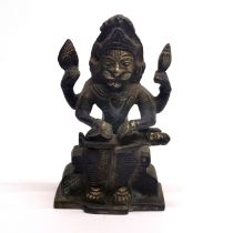 An Indian bronze figure of a lion headed deity, H. 11cm.