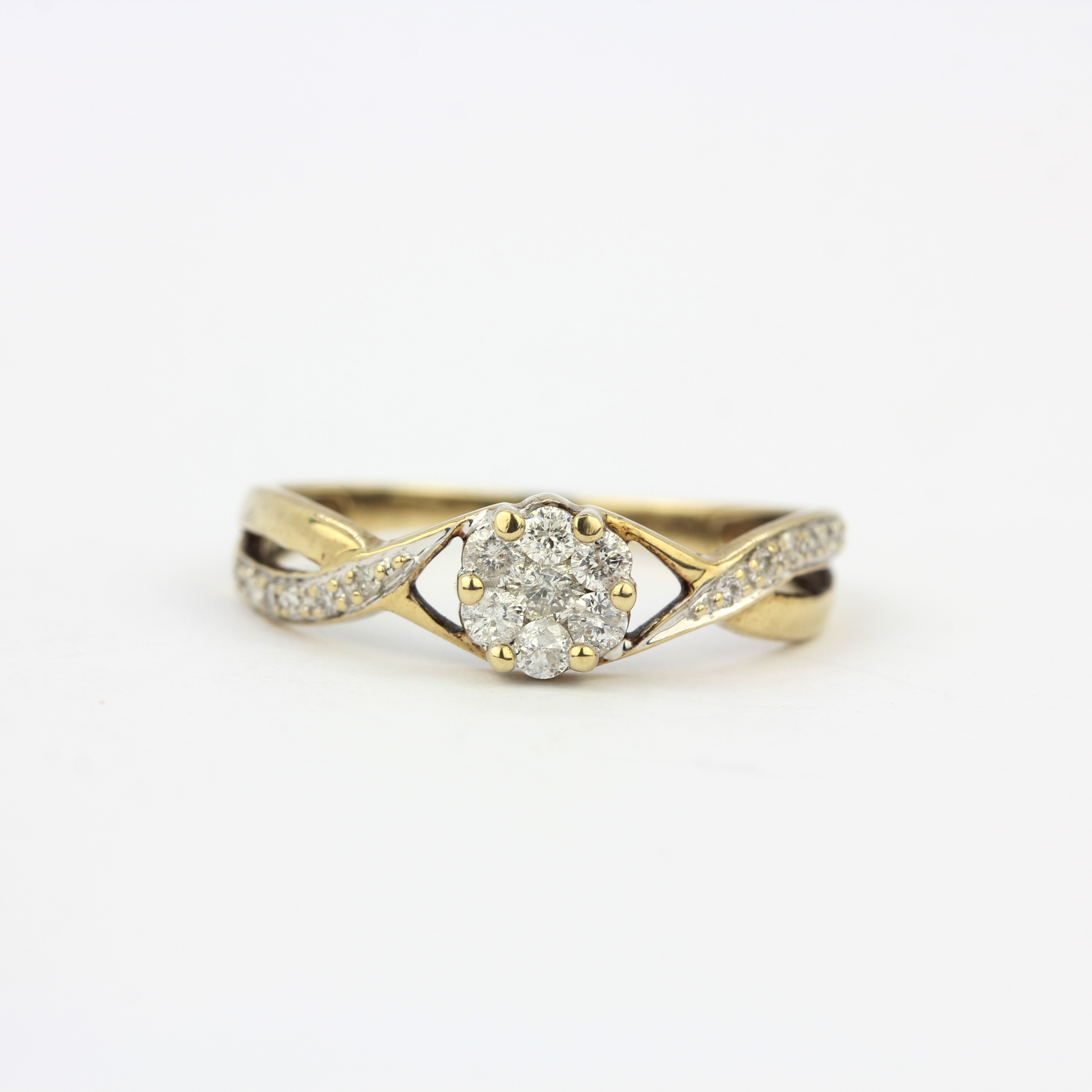 A 9ct yellow gold diamond set cluster ring with diamond set shoulders, (N). - Image 2 of 3