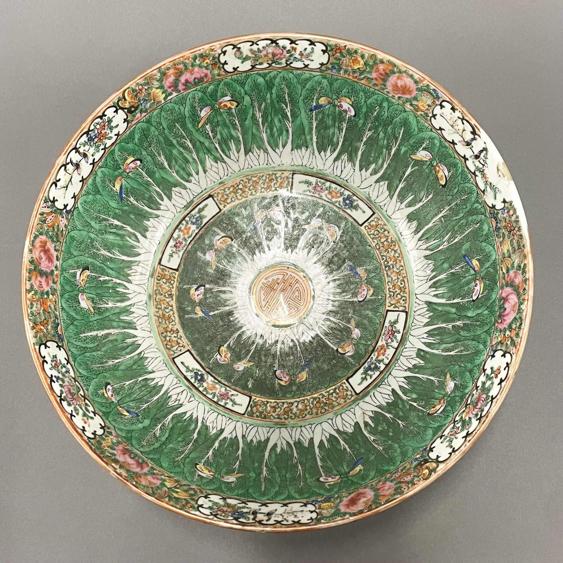 A large 19thC Chinese Canton enamelled bowl, Dia. 37cm, H. 15cm. Museum style restoration to rim. - Image 2 of 5