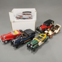 Five large diecast model vehicles, largest 24cm.