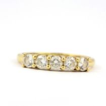 A hallmarked 18ct yellow gold stone set half eternity ring, (T).