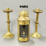 A pair of 19th century brass candlesticks with a brass carrying oil lamp, candlestick H. 23cm.
