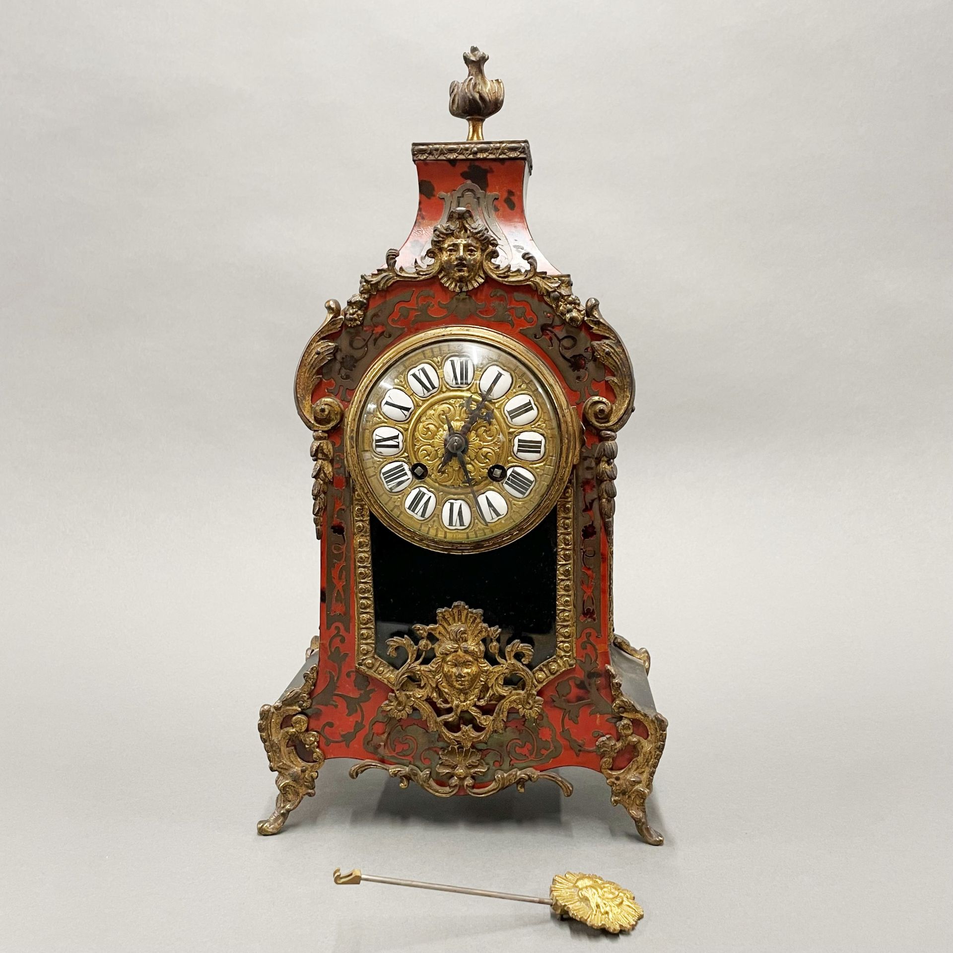 A 19thC Ormulu mounted Boulle mantel clock, H. 40cm.