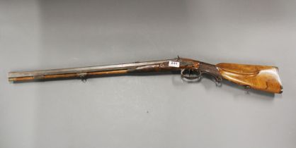 An early rifle, L. 120cm.