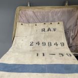 A vintage case of R.A.F uniform items.