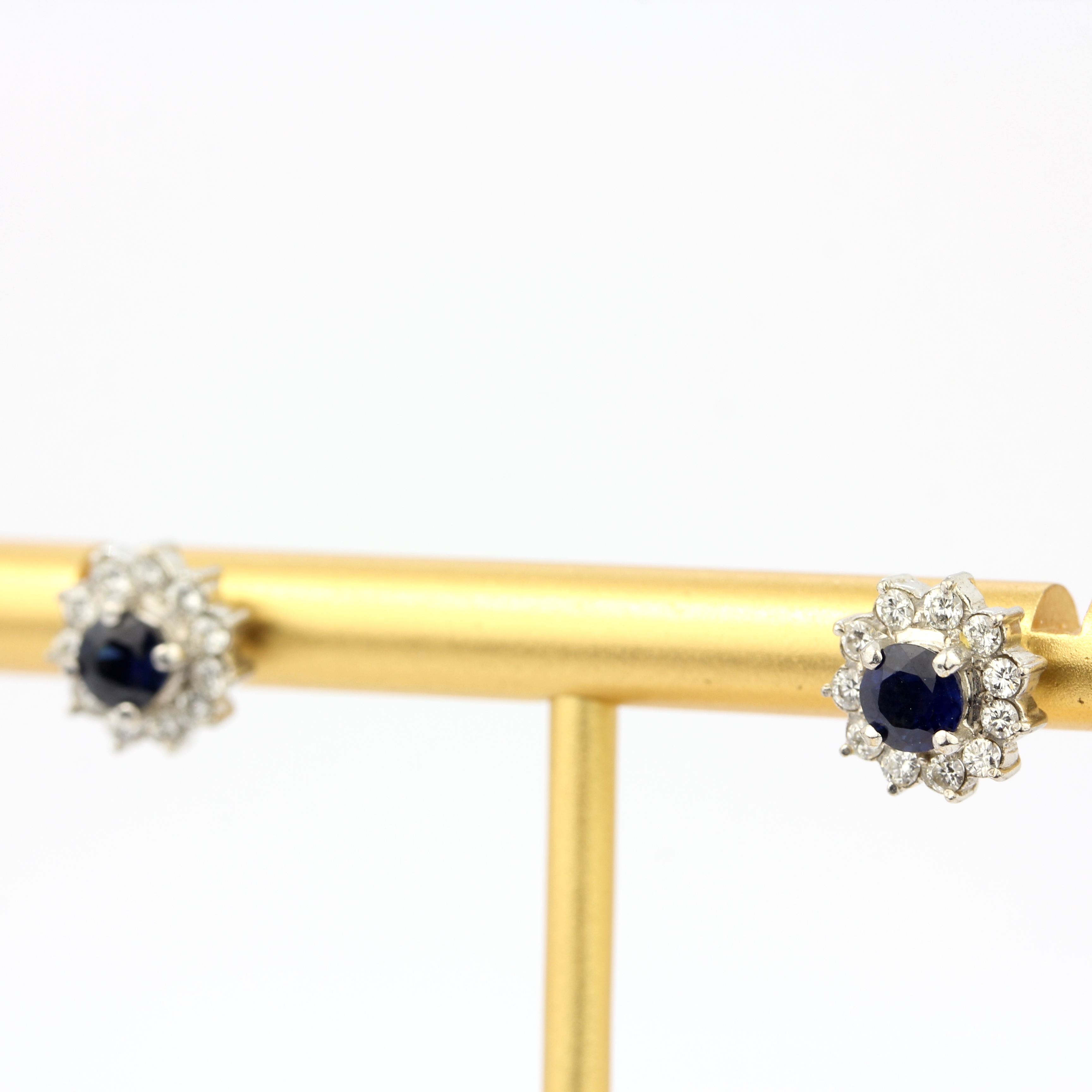 A pair of 18ct white gold cluster earrings set with sapphires and brilliant cut diamonds, Dia. 1cm. - Image 3 of 3