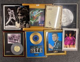 A quantity of pop and rock related framed pictures, etc.