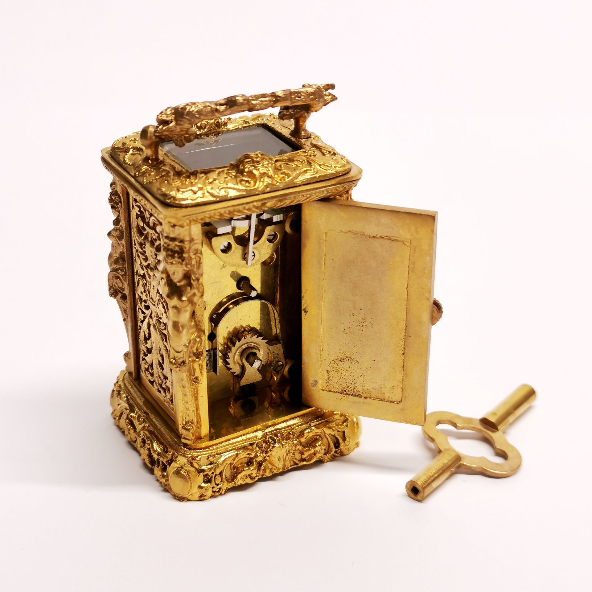 A miniature gilt brass carriage clock, H. 9cm. - Image 2 of 3