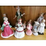 A group of Royal Doulton and other figurines.