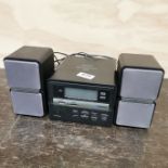 A mini digital compact disc player.