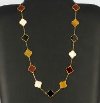 An 18ct yellow gold necklace set with tiger's eye, mother of pearl, onyx and cornelian, bead size
