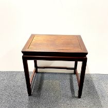 A Chinese carved hardwood table, 40 x 54 x 54cm.