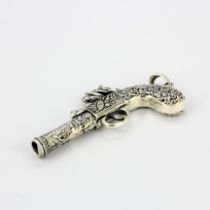 A heavy sterling silver pistol shaped pendant, L. 6.5cm.