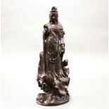 A Chinese carved hardwood figure of the goddess Guanyin, H. 40cm.