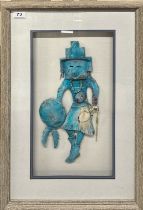 A mounted and framed copper tribal figure behind glass, signed Cooper, frame size 45.5 x 65.5cm.