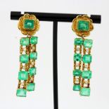 A pair of 18ct yellow gold drop earrings set with emerald cut emeralds and brilliant cut diamonds,