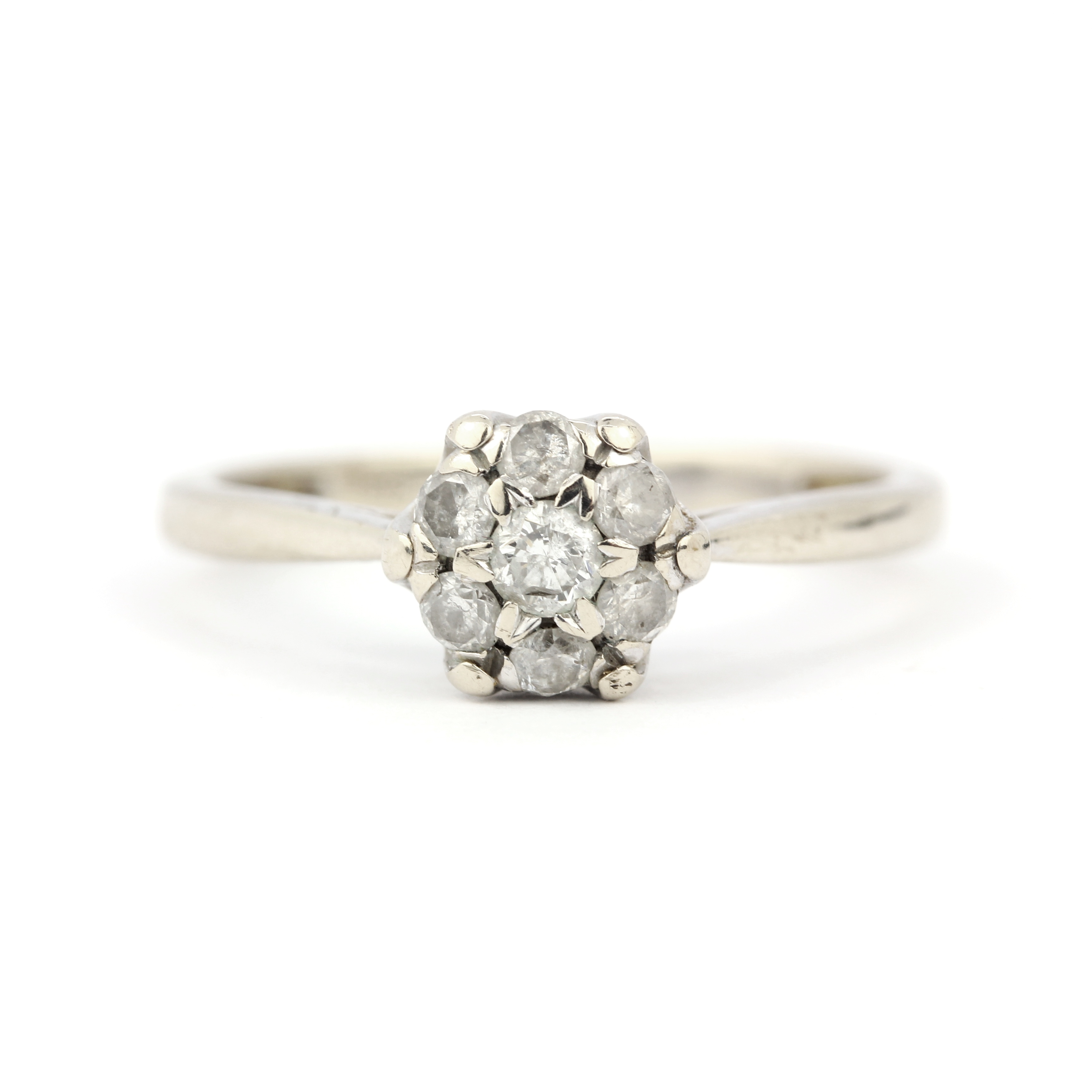 A 9ct white gold diamond set cluster ring, approx. 0.33ct overall, (O.5). - Image 2 of 3