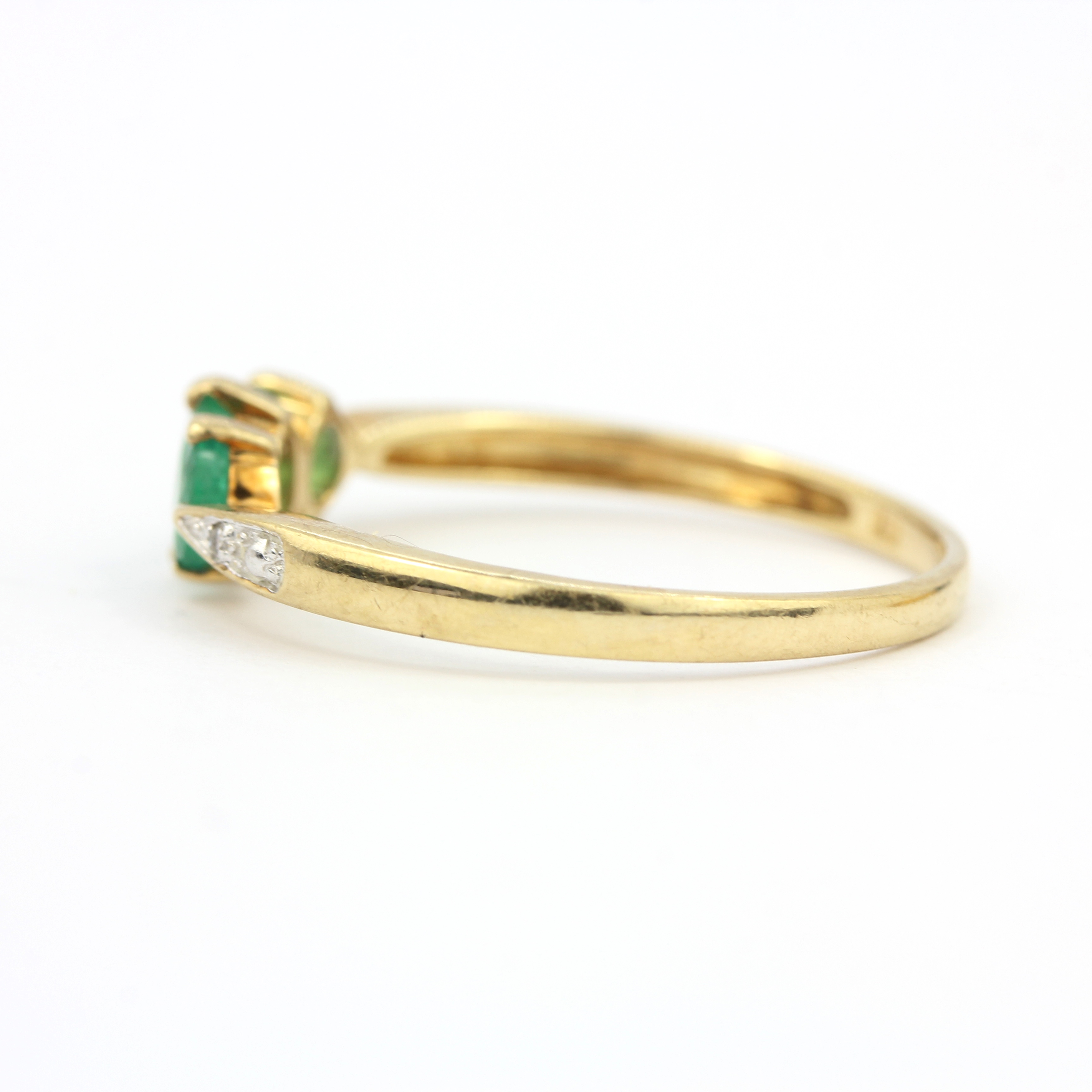 A 9ct yellow gold emerald and diamond set ring, (S). - Image 2 of 3