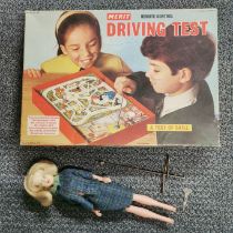 A vintage Sindy doll and a driving test game.