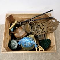 A wooden box of mixed metalware.