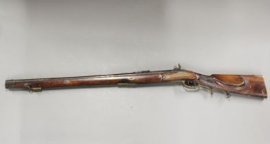 An early rifle, L. 120cm.