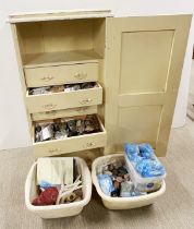 A cabinet and two boxes filled with rocks and minerals.