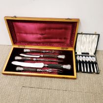 A cased antler handled carving set with a box of silverplated teaspoons, box size 47 x 23cm.
