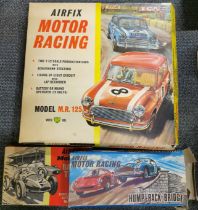 A boxed Airfix motor racing set and accessories.