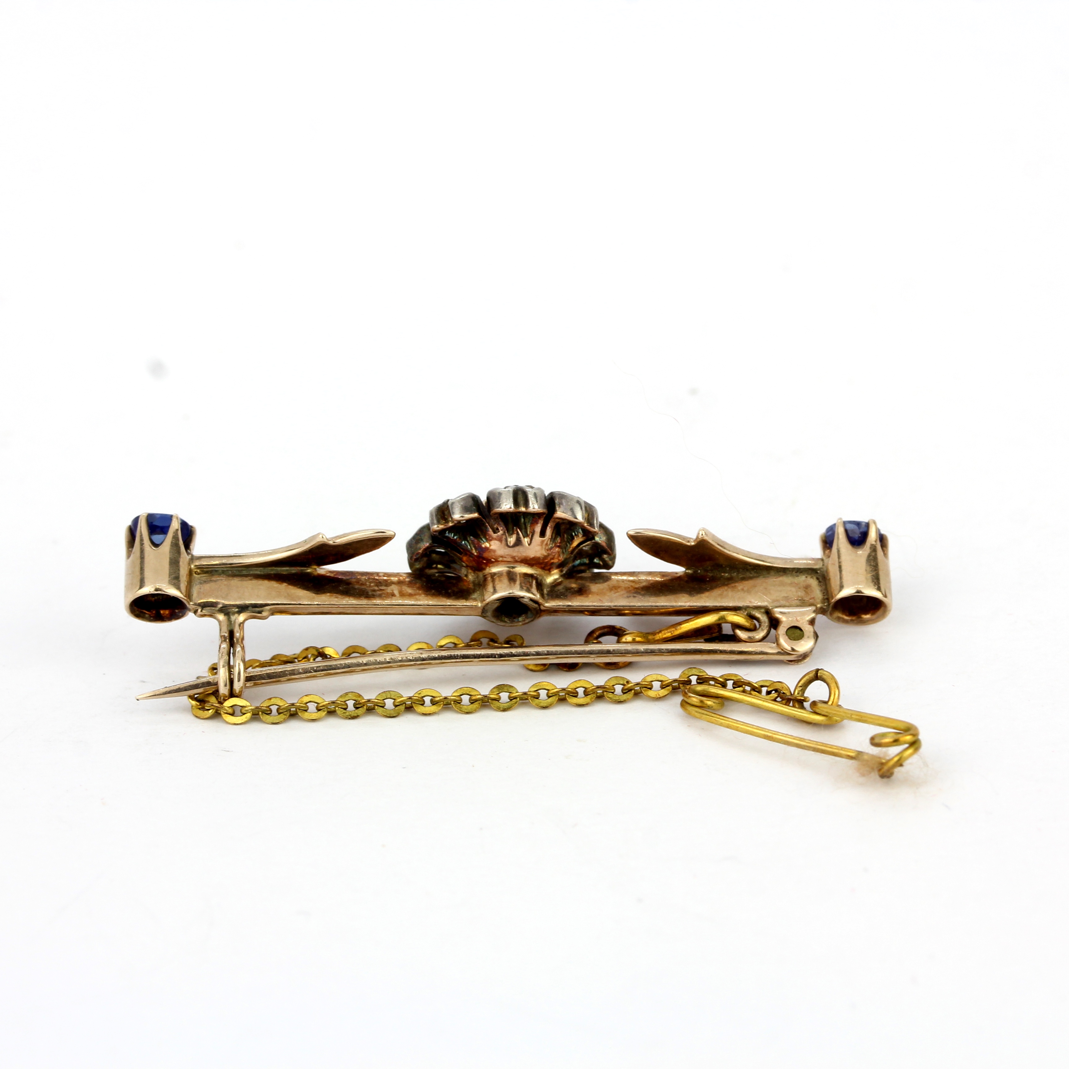 A rose metal (tested minimum 9ct gold) brooch set with sapphires and diamonds, L. 4.5cm. - Image 2 of 4