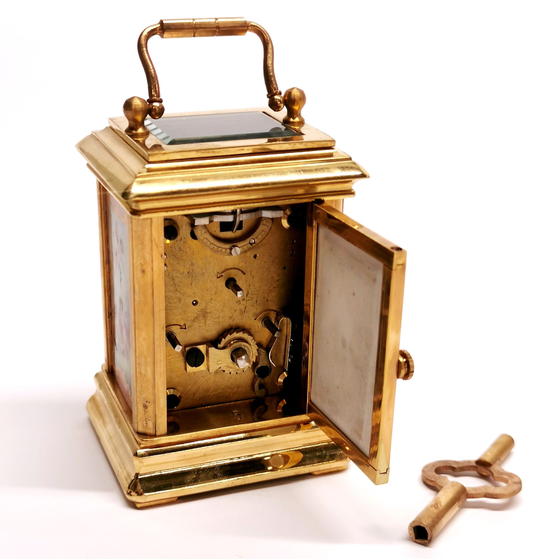 A miniature gilt brass and porcelain carriage clock, H. 10cm. - Image 2 of 3