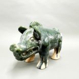 A large Chinese Ming dynasty style green glazed terracotta figure of a wild boar, L. 41cm, H. 28cm.