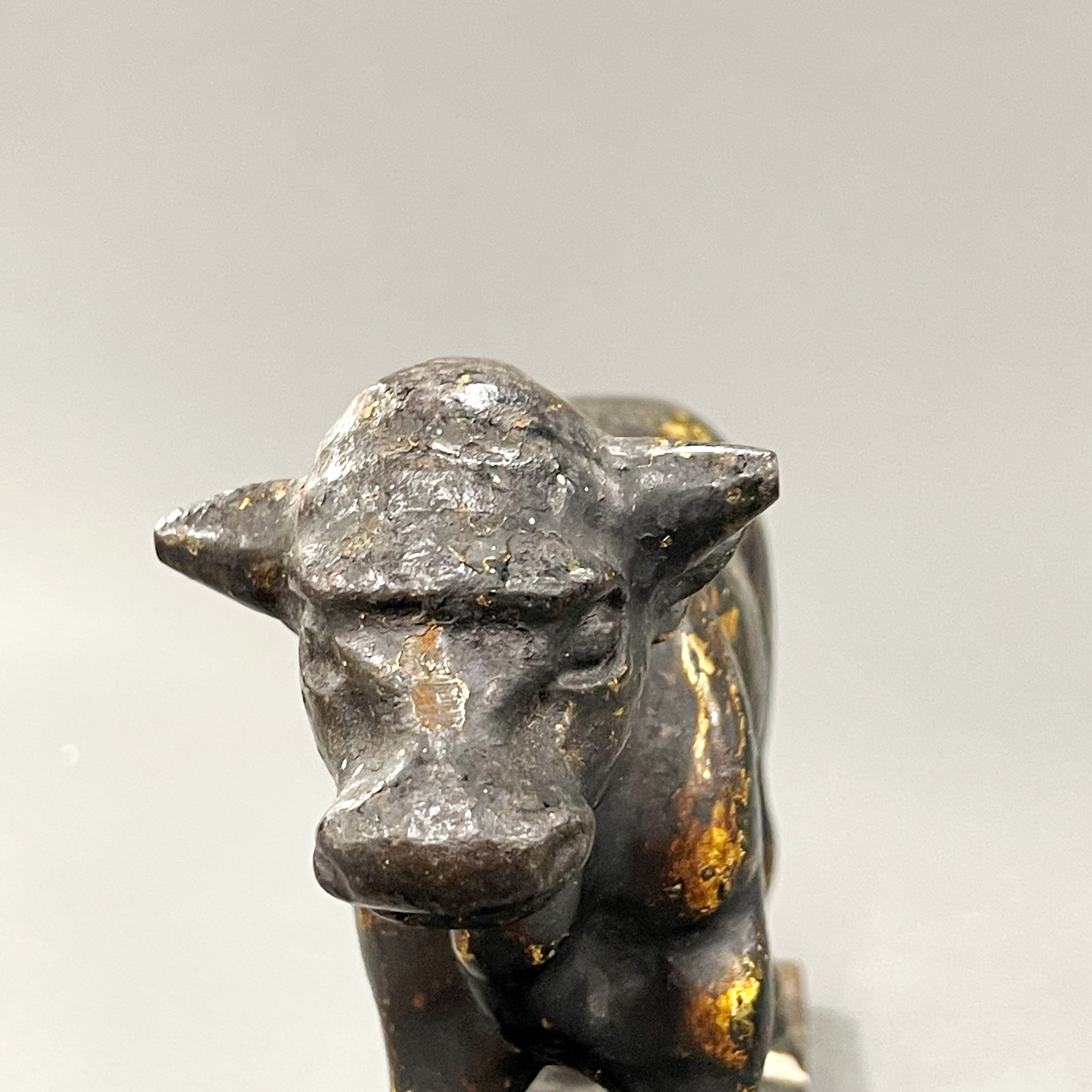 A 19th century cast bronze butchers shop window bull, L. 17cm, H. 10cm. - Image 4 of 4