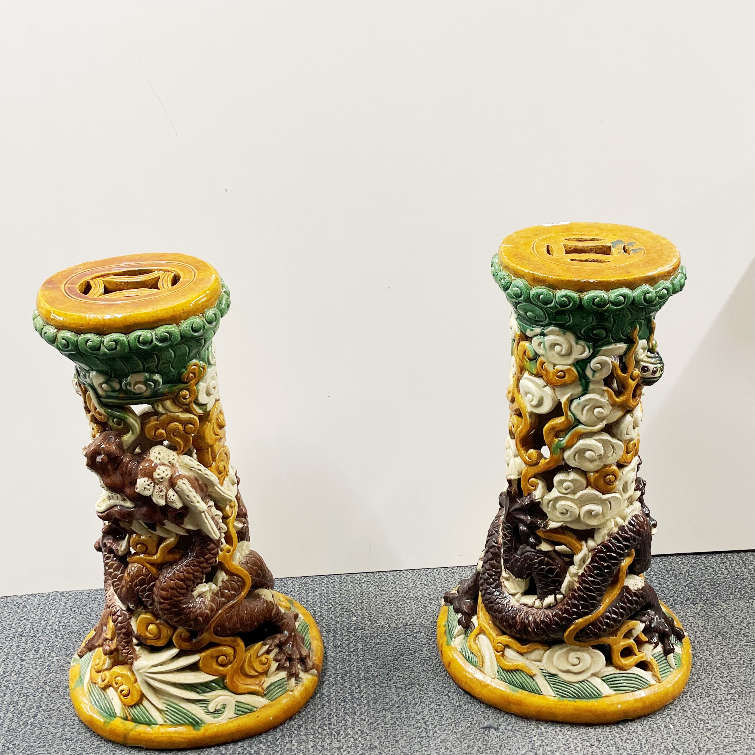 An impressive pair of large Chinese glazed terracotta planters on stands, relief decorated with - Image 5 of 7