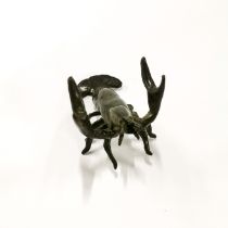 A miniature bronze figure of a lobster, L. 6cm, H. 4cm.