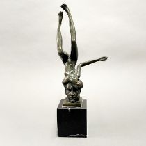 An interesting bronze figure on a marble base, signed Nick, H.36cm.