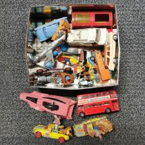 A box of mixed diecast toy model vehicles.